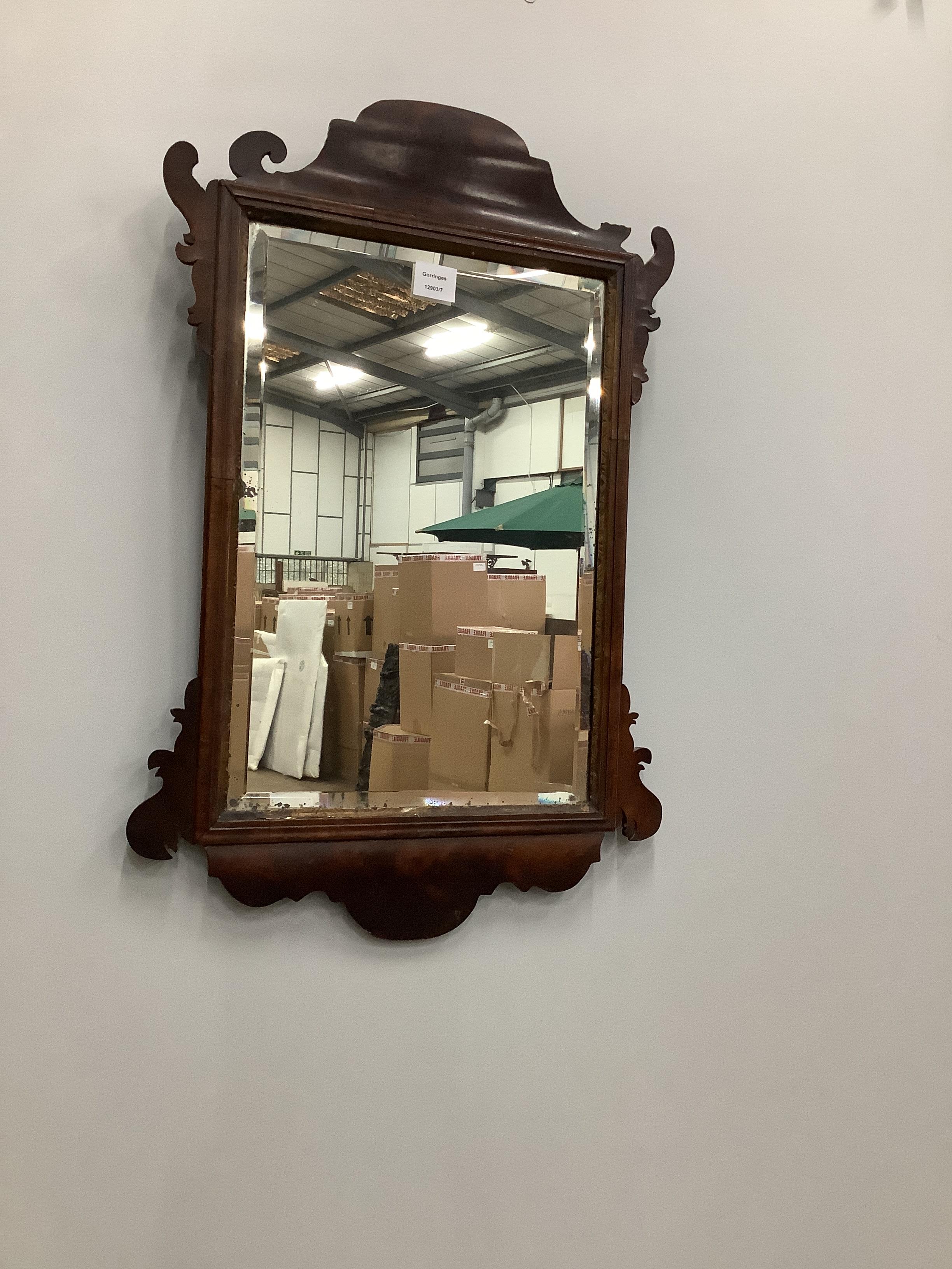 An 18th century style mahogany fret cut wall mirror, width 50cm, height 77cm